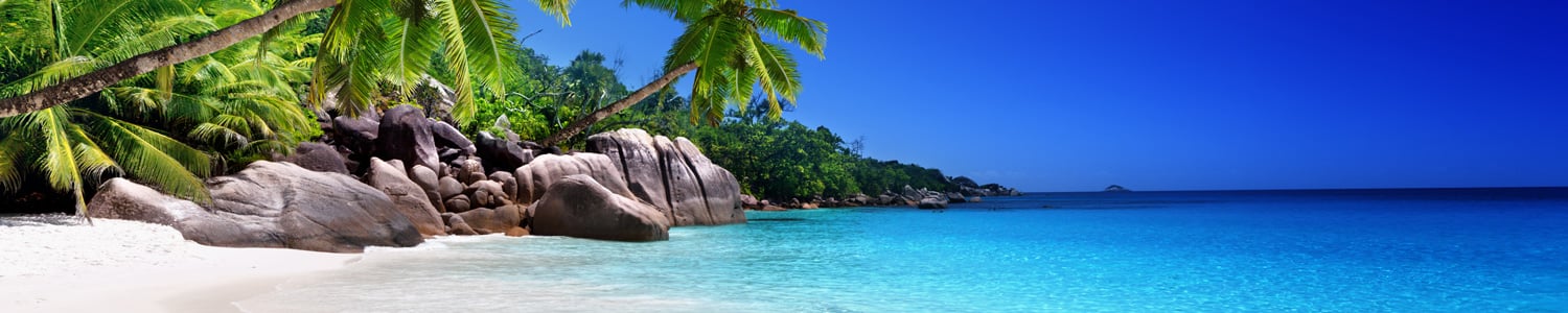 Vol pas cher vers les Seychelles Plage sable blanc paradisiaque aux Seychelles - Air Austral
